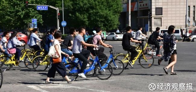 经济观察报: 共享单车中场酣战 共赢还是寡头垄